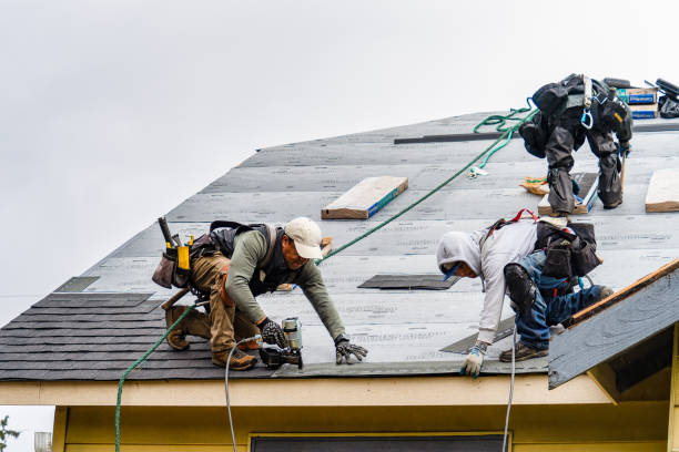 Professional Gutter Installation technician working in Brighton, IA